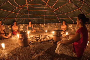 Traditional temazcal ceremony with steam and heat.